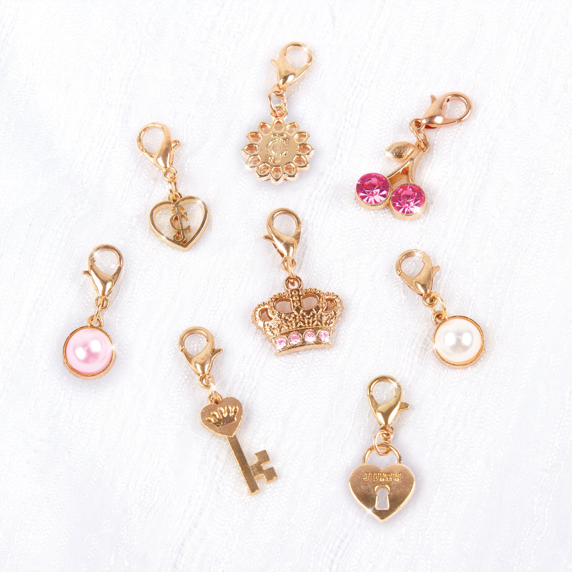 Juicy Couture Jewelry | Juicy Couture Bracelet w/ 17 Charms | Color: Gold/Pink | Size: Os | Pm-26013724's Closet